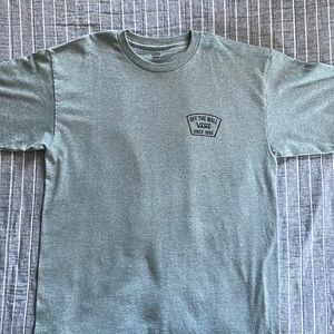 Vans t-shirt size medium with logo on front and back of shirt. Color Gray.
